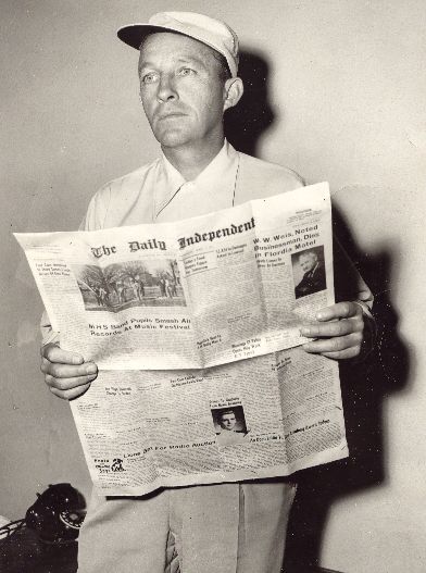 Bing Reading Rosemary's hometown newspaper, Maysville's Daily Independent